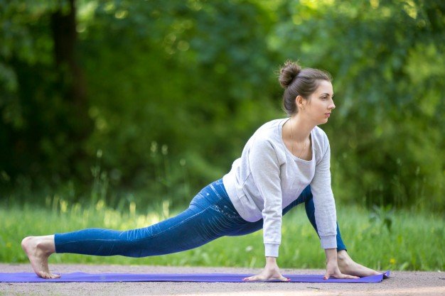 stretching-exercises-park-alley-wearing-tight-clothes