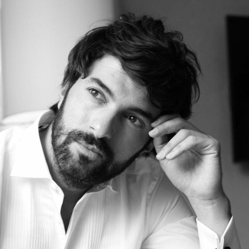 Engin Akyurek in white shirt black and white turkish actor photo